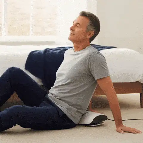 BackRelease Pro in use beneath the lower back